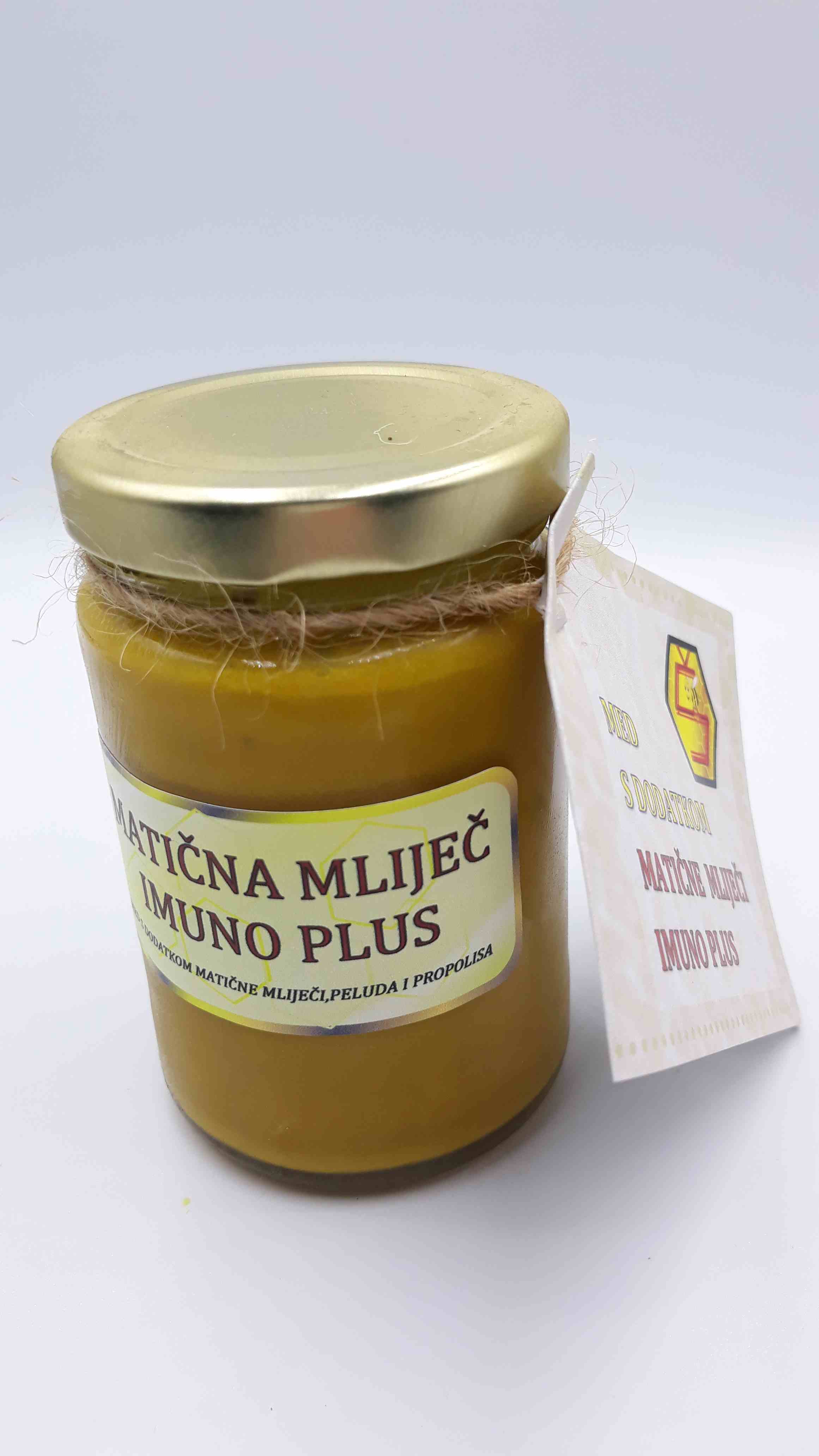 staklenka meda s matičnom mliječi.